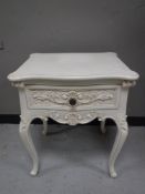 A French style bedside table,