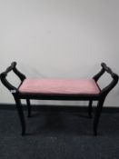 A black painted duet stool