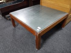 A mid 20th century teak slate top coffee table