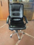 A high backed swivel office armchair