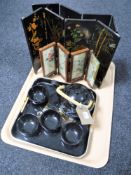 A tray of three four-fold table screens,