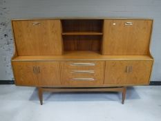 A mid twentieth century teak G plan sideboard