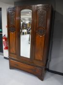 A Victorian mahogany mirror door wardrobe (lacking cornice) CONDITION REPORT: 187cm