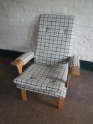 A late twentieth century Danish beech framed high back armchair,