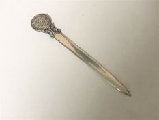 An Arabic letter knife stamped 925