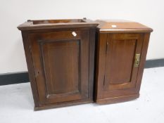 Two mahogany single door wall cabinets