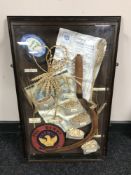 A display case containing grain samples and ephemera