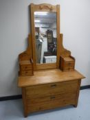 An early 20th century pine dressing chest