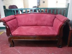 An antique mahogany framed hall settee,