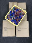 Four boxes of Loom Bands and a box of glitter