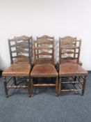 A set of six antique country kitchen rail back chairs with leather seats