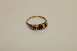 An antique ruby and diamond ring, size M, 2g.