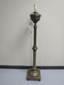 A brass Corinthian column standard lamp