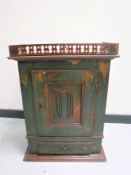 A hand painted pine wall cabinet