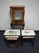 A nest of three walnut tables,