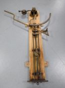 A vintage set of brass piston scales manufactured by the Good Brand & Company Makers Manchester,