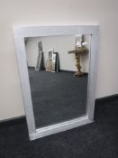 A silver framed mirror