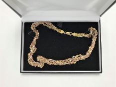 A three tone sterling silver rope necklace