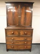 A Regency mahogany secretaire cabinet,