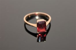 A 9ct gold garnet solitaire ring,
