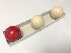 Three 19th century ivory billiard balls