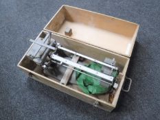 A cased set of micro balance scales