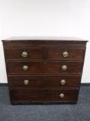 A Georgian inlaid mahogany five drawer chest