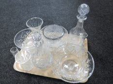 A tray of cut glass decanters, vases,