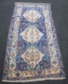 An Afghan Balouch rug of unusual colours,
