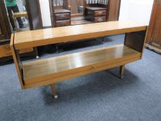 A 1970's two tier dumbwaiter trolley