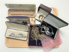 A collection of costume jewellery, necklaces, chains etc.