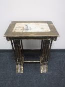 A nest of four hand painted tables,