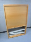 A wooden shutter front office cabinet