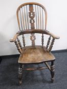 A 19th century elm Windsor armchair