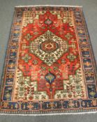 A Persian Nahavand rug 200 cm x 140 cm