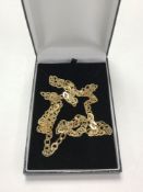 A long sterling silver necklace