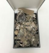 A collection of continental silver and white metal filigree jewellery including pendants, earrings,