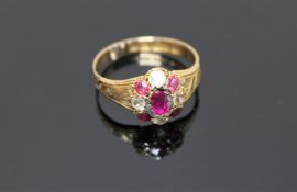 A 15ct gold ruby and citrine ring,
