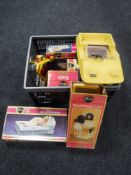 A crate of boxed and unboxed Cindy accessories