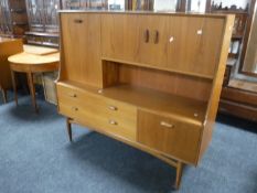 A 1970's teak sideboard