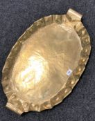 A large Arts & Crafts brass twin handled tray,