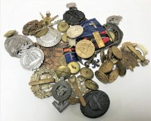 A collection of replica Third Reich and other pin badges, silver and enamel RAF brooch,