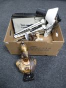A box of angle poise lamp, Egyptian busts,