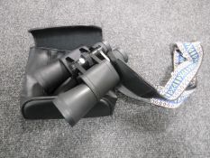 A pair of Minolta binoculars, MK 1521158, 7 x 21 x 50, multi-coated, with lens caps, with strap,