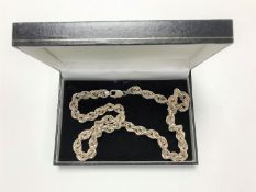 A sterling silver fancy twist necklace, 68.2g.