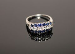 An 18ct white gold sapphire and diamond ring