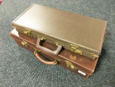 A vintage stitched leather briefcase with initials A.V.Y.