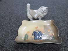 A Beswick figure of a cat together with a Royal Doulton Dickens plate