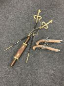 A pair of replica flintlock pistols together with a pair of gilt swords and a two piece Eastern