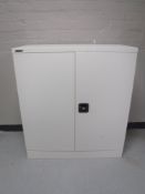 A Dams double door metal stationary cabinet with keys